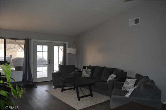 36913 Tobira Dr, Palmdale, CA 93550 - living area featuring dark wood finished floors and french doors
