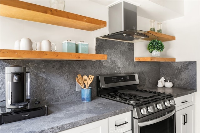 4040 Grand View Blvd Unit 35, Los Angeles, CA 90066 - kitchen with stainless steel gas range, open shelves, island exhaust hood, white cabinetry, and backsplash