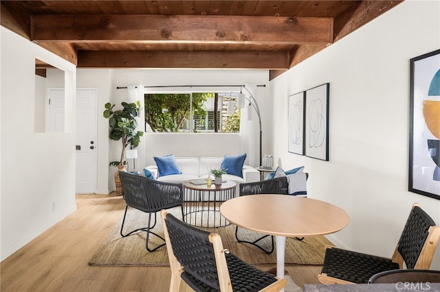 4040 Grand View Blvd Unit 35, Los Angeles, CA 90066 - dining room with beamed ceiling, wood ceiling, and light wood-type flooring