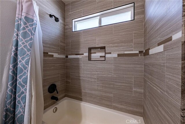1143 Webster St, Redlands, CA 92374 - bathroom featuring shower / tub combo with curtain