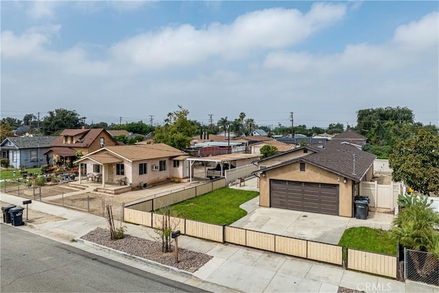 1143 Webster St, Redlands, CA 92374 - view of front of property with driveway, a fenced front yard, a residential view, a gate, and a garage