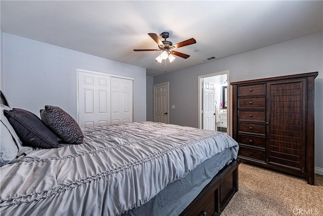 1143 Webster St, Redlands, CA 92374 - bedroom with visible vents, a closet, light colored carpet, connected bathroom, and a ceiling fan