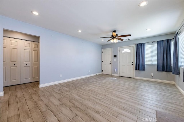 1143 Webster St, Redlands, CA 92374 - unfurnished living room with light wood-style floors, baseboards, ceiling fan, and recessed lighting
