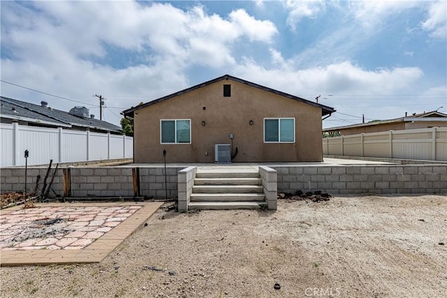 1143 Webster St, Redlands, CA 92374 - rear view of house featuring fence private yard and stucco siding