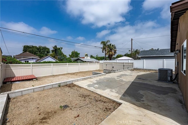 1143 Webster St, Redlands, CA 92374 - view of yard featuring cooling unit, a wooden deck, a fenced backyard, and a patio area