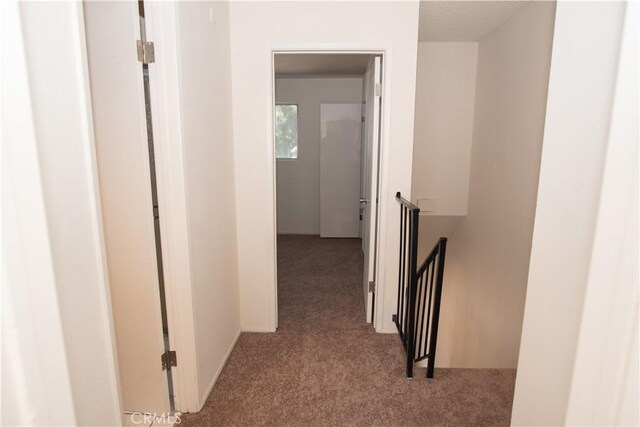 719 N Eucalyptus Ave Unit 19A, Inglewood, CA 90302 - corridor featuring an upstairs landing and carpet