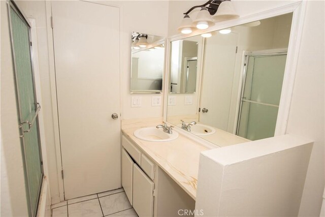 719 N Eucalyptus Ave Unit 19A, Inglewood, CA 90302 - full bathroom with vanity and a shower with door