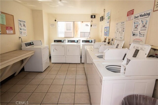 719 N Eucalyptus Ave Unit 19A, Inglewood, CA 90302 - community laundry room with separate washer and dryer and light tile patterned flooring