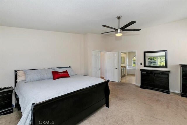 1618 Southport Dr, Riverside, CA 92506 - bedroom featuring light colored carpet, a ceiling fan, and ensuite bath