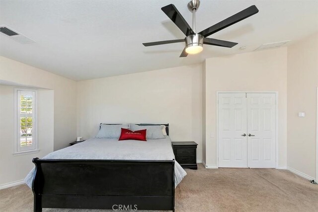 1618 Southport Dr, Riverside, CA 92506 - bedroom with light colored carpet, baseboards, and ceiling fan