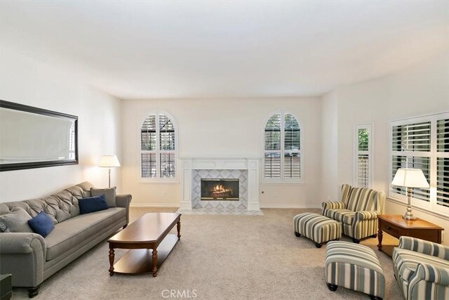 1618 Southport Dr, Riverside, CA 92506 - living area with a premium fireplace, baseboards, and carpet