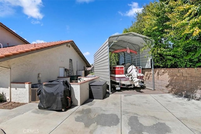 1618 Southport Dr, Riverside, CA 92506 - view of patio featuring a carport