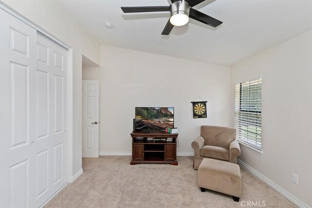 1618 Southport Dr, Riverside, CA 92506 - living area featuring carpet floors, a ceiling fan, and baseboards