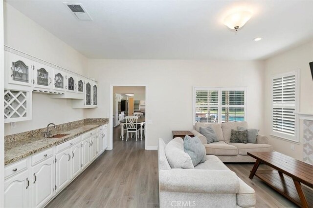 1618 Southport Dr, Riverside, CA 92506 - living area featuring light wood-style flooring