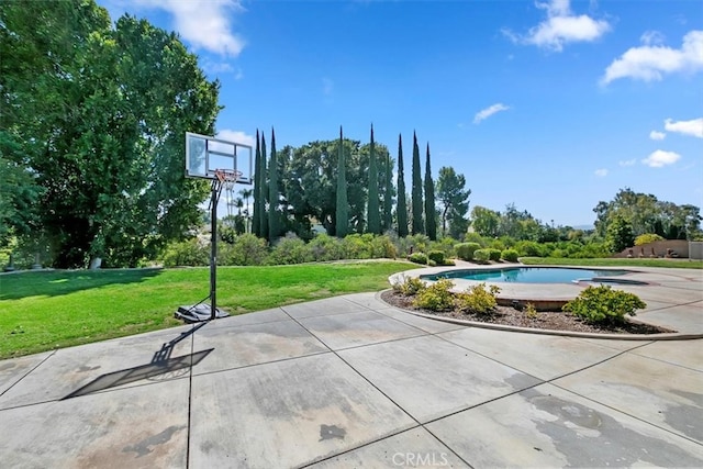 1618 Southport Dr, Riverside, CA 92506 - view of sport court with a yard and an outdoor pool