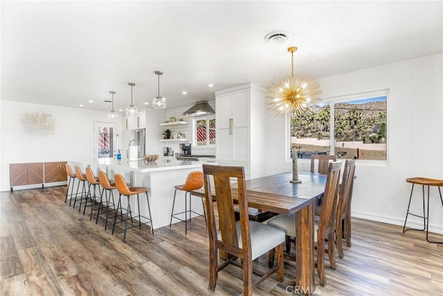 54660 Benecia Trl, Yucca Valley, CA 92284 - dining area featuring a chandelier, light wood-style flooring, recessed lighting, and baseboards