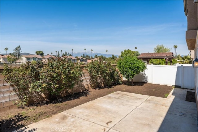 1677 Catania Dr, Riverside, CA 92507 - view of patio / terrace with a fenced backyard and a residential view