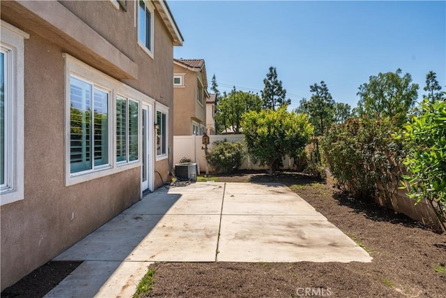 1677 Catania Dr, Riverside, CA 92507 - view of patio / terrace with a fenced backyard and central air condition unit