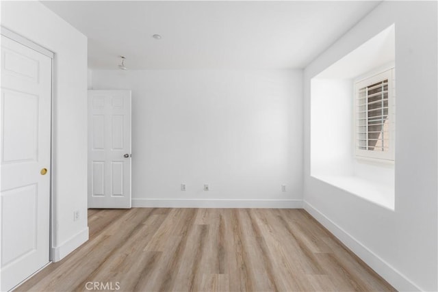 1677 Catania Dr, Riverside, CA 92507 - spare room with baseboards and light wood-style flooring