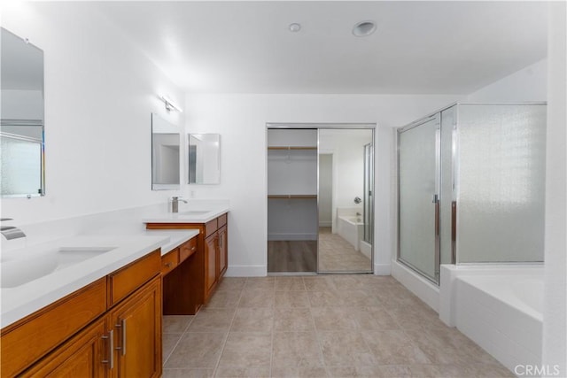 1677 Catania Dr, Riverside, CA 92507 - full bathroom with a stall shower, double vanity, a sink, and tile patterned floors