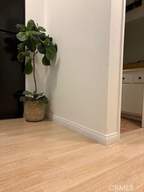 room details with wood finished floors and baseboards
