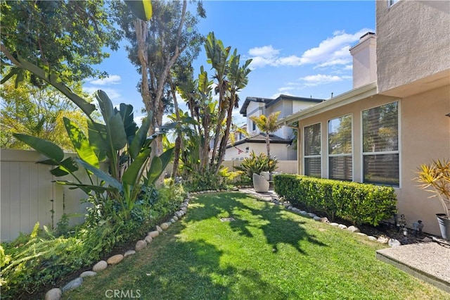 view of yard with fence