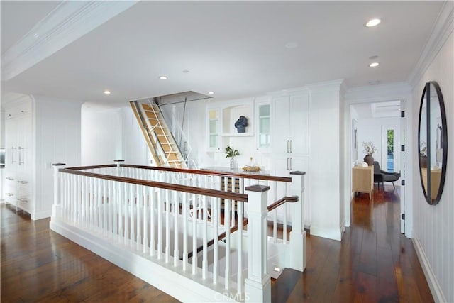 89 S La Senda Dr, Laguna Beach, CA 92651 - corridor featuring dark wood finished floors, an upstairs landing, ornamental molding, a decorative wall, and recessed lighting
