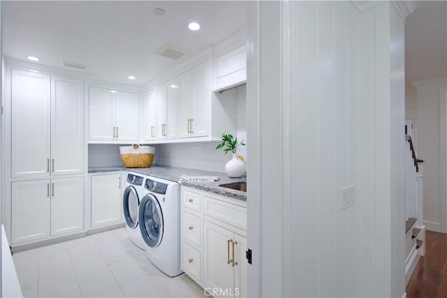 89 S La Senda Dr, Laguna Beach, CA 92651 - laundry area with separate washer and dryer, recessed lighting, and cabinet space
