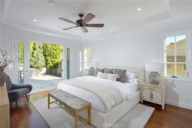 89 S La Senda Dr, Laguna Beach, CA 92651 - bedroom featuring access to outside, a tray ceiling, and hardwood / wood-style flooring