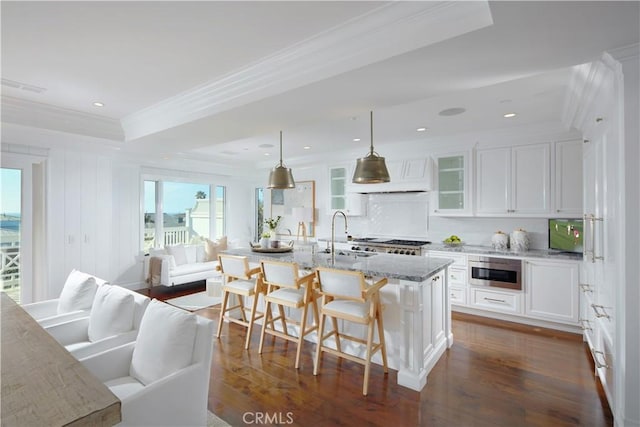 89 S La Senda Dr, Laguna Beach, CA 92651 - kitchen with crown molding, a sink, white cabinetry, decorative backsplash, and glass insert cabinets