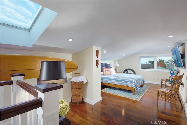 89 S La Senda Dr, Laguna Beach, CA 92651 - bedroom featuring recessed lighting, baseboards, wood finished floors, and vaulted ceiling with skylight