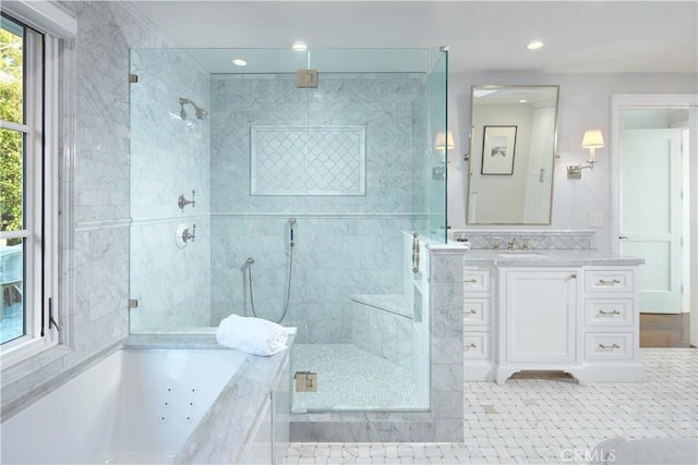 89 S La Senda Dr, Laguna Beach, CA 92651 - bathroom featuring a jetted tub, vanity, tile patterned floors, recessed lighting, and tiled shower