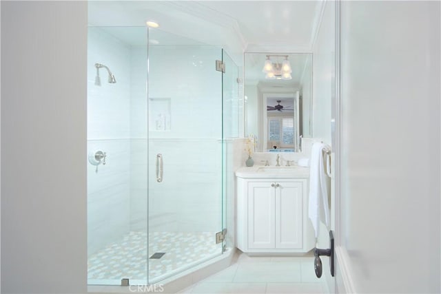89 S La Senda Dr, Laguna Beach, CA 92651 - full bathroom with vanity, tile patterned floors, ornamental molding, and a shower stall