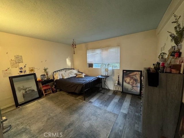 505 E Madison Ave Unit 84, El Cajon, CA 92020 - bedroom with wood finished floors and a textured ceiling