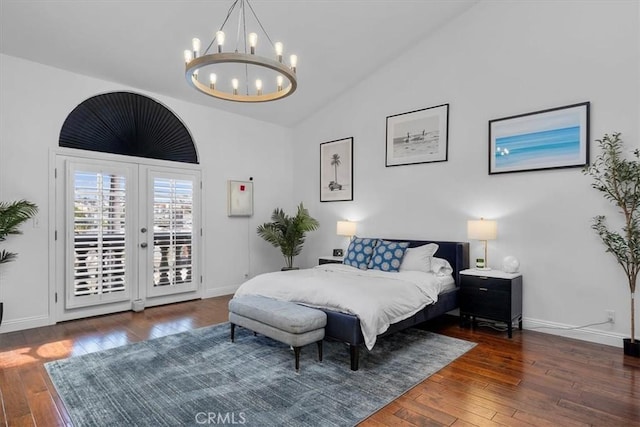 515 N Gertruda Ave Unit 9, Redondo Beach, CA 90277 - bedroom featuring access to exterior, a chandelier, hardwood / wood-style floors, lofted ceiling, and baseboards
