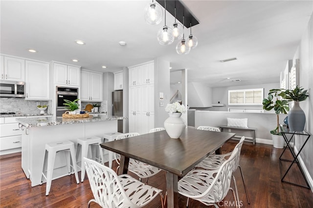 515 N Gertruda Ave Unit 9, Redondo Beach, CA 90277 - dining area featuring dark wood-style floors, recessed lighting, and baseboards