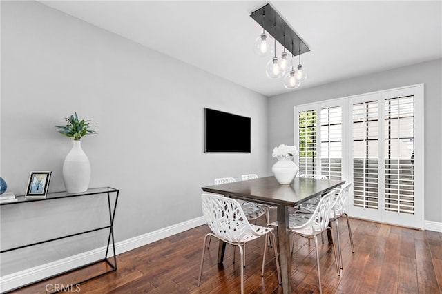 515 N Gertruda Ave Unit 9, Redondo Beach, CA 90277 - dining area featuring baseboards, wood finished floors, and a chandelier