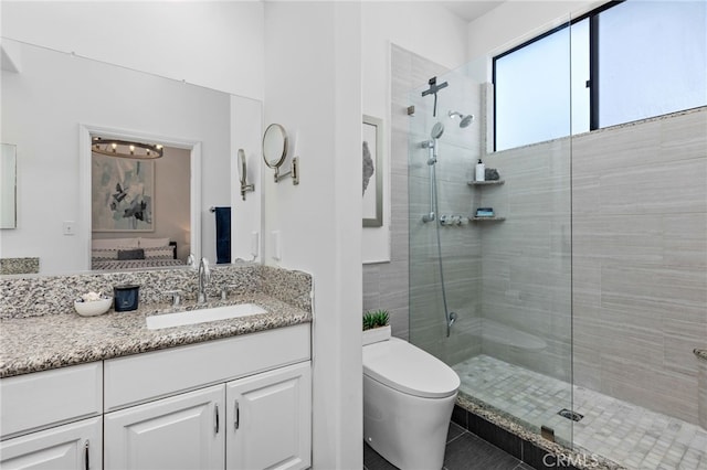 515 N Gertruda Ave Unit 9, Redondo Beach, CA 90277 - bathroom featuring a shower stall, toilet, and vanity