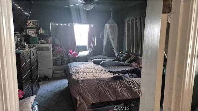 bedroom featuring tile patterned flooring