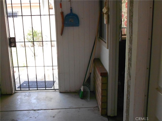 1312 Pleasant Vw, Corona, CA 92882 - interior space featuring wood walls and concrete flooring