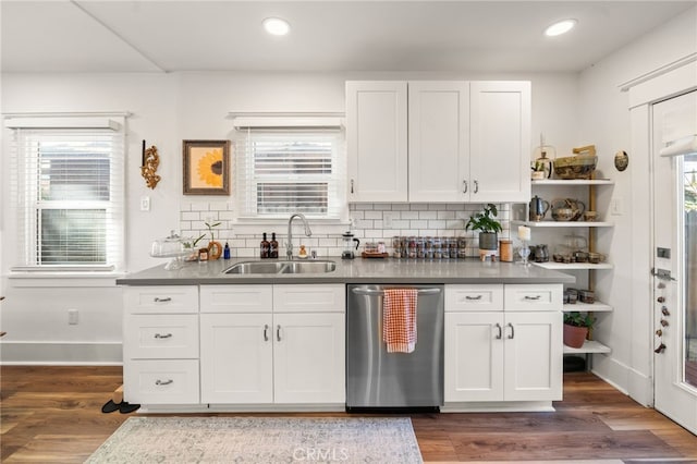 kitchen featuring open shelves, dishwasher, a sink, tasteful backsplash, and white cabinetry