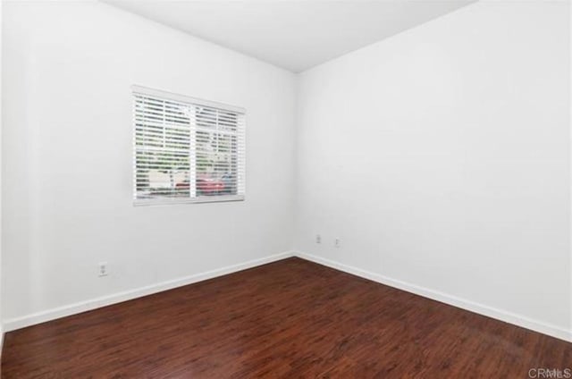 26364 Arboretum Way Unit 3301, Murrieta, CA 92563 - empty room featuring dark wood-type flooring and baseboards