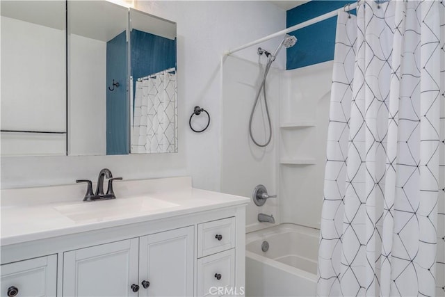 bathroom featuring vanity and shower / tub combo with curtain