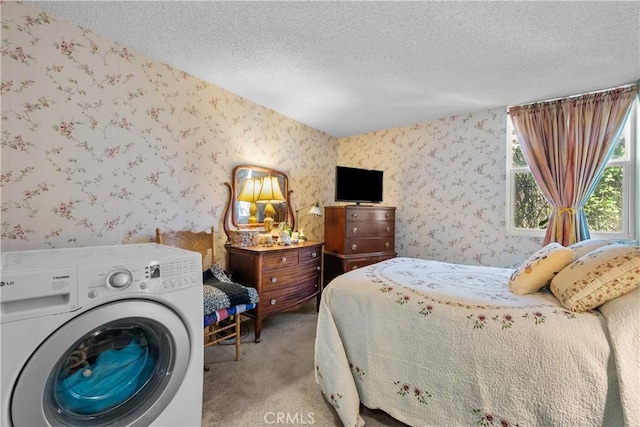 18620 Hatteras St Unit 143, Tarzana, CA 91356 - bedroom featuring washer / dryer, wallpapered walls, light colored carpet, and a textured ceiling