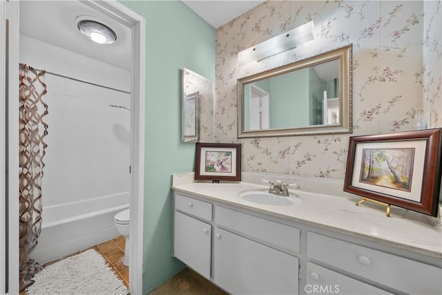 18620 Hatteras St Unit 143, Tarzana, CA 91356 - bathroom with wallpapered walls, vanity, toilet, tile patterned flooring, and shower / bath combination with curtain
