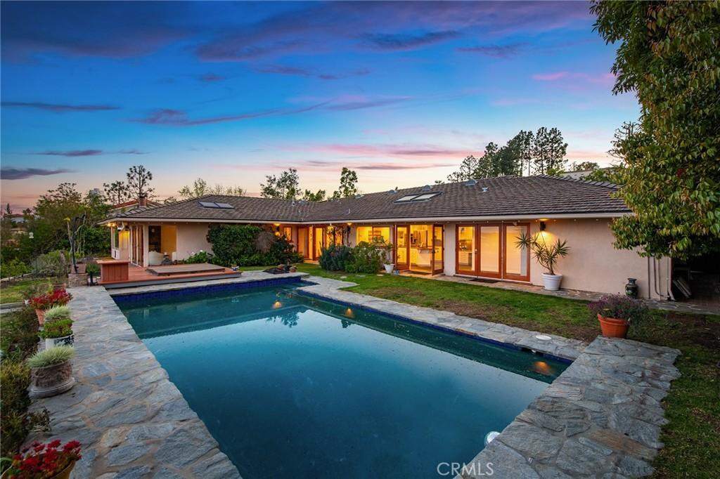 1420 Stradella Rd, Los Angeles, CA 90077 - outdoor pool with a patio area