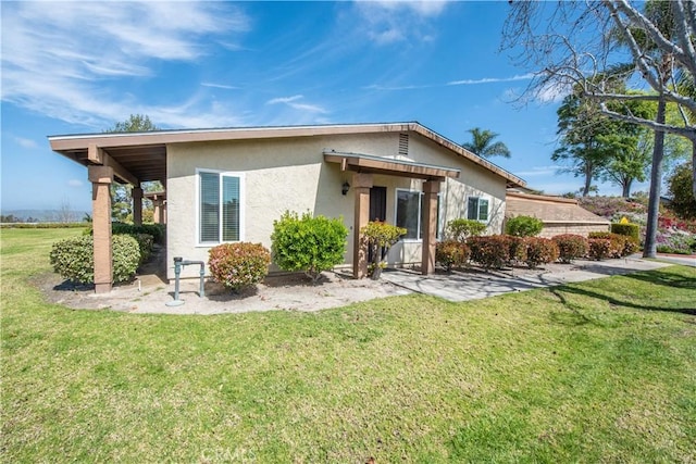 4433 Albatross Way, Oceanside, CA 92057 - back of property with stucco siding and a lawn