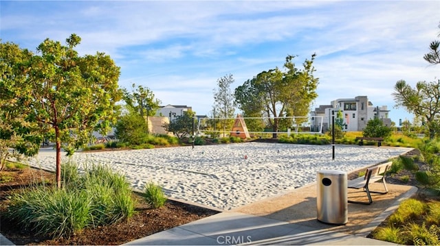 view of property's community featuring volleyball court
