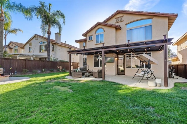4355 Leonard Way, Corona, CA 92883 - rear view of property featuring a patio, an outdoor living space, a fenced backyard, and stucco siding