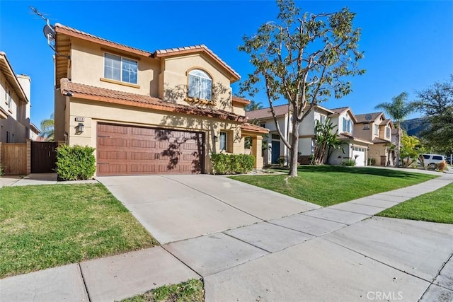 4355 Leonard Way, Corona, CA 92883 - mediterranean / spanish-style house with a tile roof, a front lawn, a garage, driveway, and stucco siding